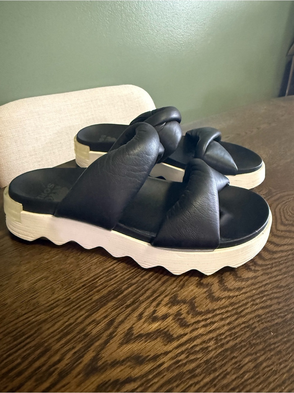 Sorel Black Knotted Slide Sandals with White Platform Sole